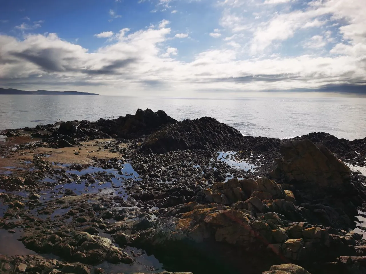 Мыс Менапуцы: Там, где Охотское море встречает небо.