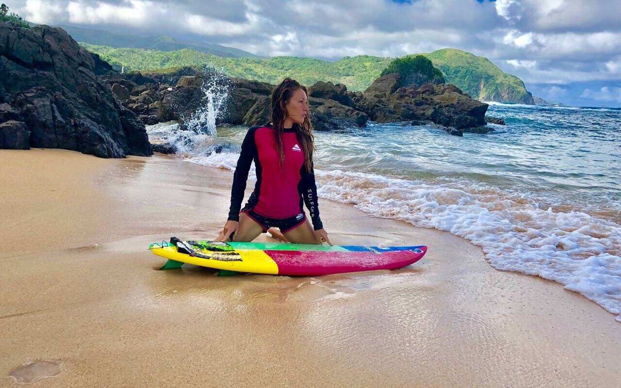 A women surfing at Philippines island